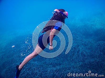 True underwater exploration in apnea Stock Photo