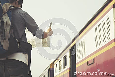 Freedom and active lifestyle conceptâ€¨ traveler searching right direction on map. Stock Photo