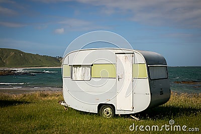 Freedom camping in caravan at an East Coast beach, Gisborne, North Island, New Zealand Editorial Stock Photo