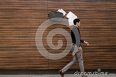 Freedom carefree business man papers air no work Stock Photo