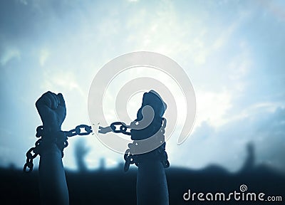 human hands raising and broken chains Stock Photo