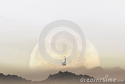 Freedom concept of a woman jumping in front of a giant moon Stock Photo