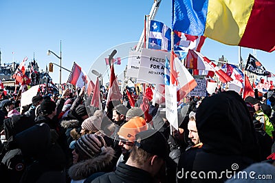 Ottawa, Ontario, Canada - Feb 05, 2022 - Freedom Convoy protestors rally in front of Parliament. Editorial Stock Photo