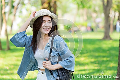 Freedom and Finding Concept: Casual cute smart Asian women walking in the park Stock Photo