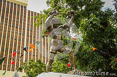 Freedom Monument - a man breaks the chains of slavery - in the center of the capital near the municipality building Editorial Stock Photo