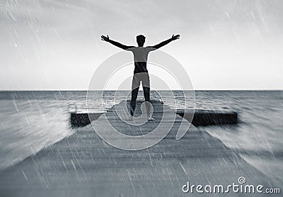 Freedom in nature concept - free man in the rain Stock Photo