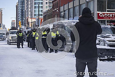 Freedom protestor in Ottawa confronts police before they march Editorial Stock Photo