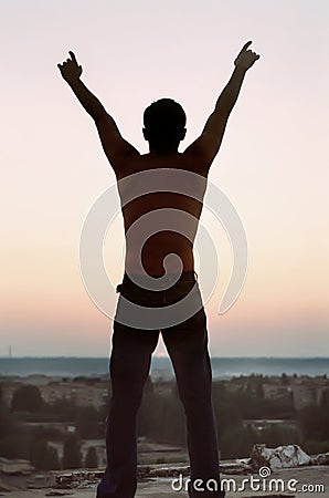 Freedom. Silhouette young man Stock Photo