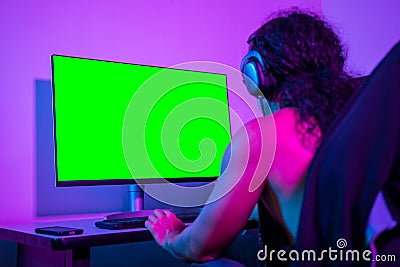 Freelance programmer doing a project from his computer. Replaceable screens to use content. Stock Photo