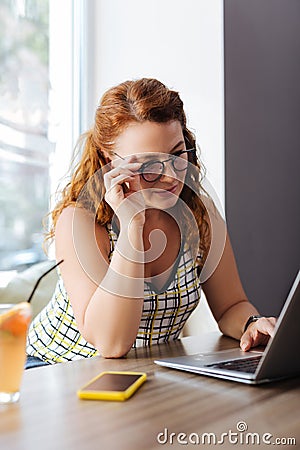 Famous freelance writer working on her new novel Stock Photo