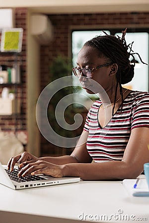 Freelancer working, remote copywriter typing on laptop keyboard Stock Photo