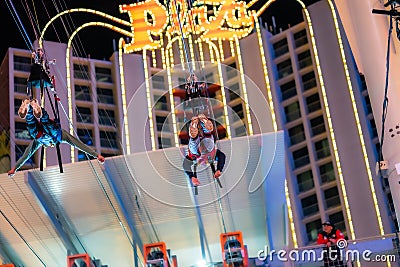 Freemont street, fun, men and woman in ropes Editorial Stock Photo