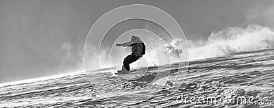 Freestyle snowboarder jump and ride Stock Photo