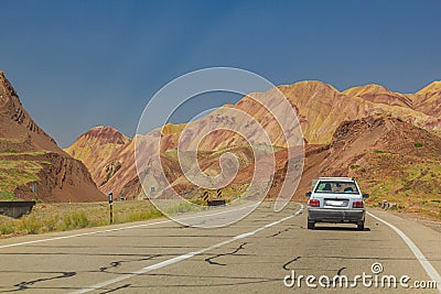 Freeway through colorful rainbow Aladaglar mountains in Eastern Azerbaijan, Ir Stock Photo