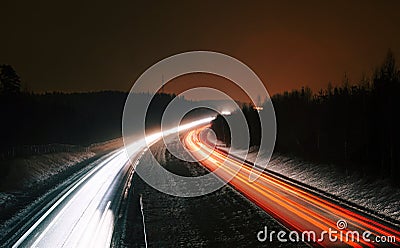 Freeway Light Trails at night Stock Photo