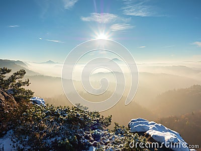 Freeze autumn trek, rocks covered with first fresh snow. Stock Photo