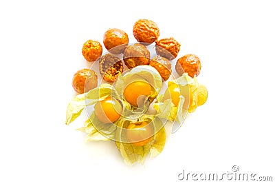 Freeze dried and fresh physalis on a white background. Stock Photo
