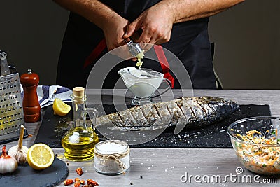 Freezer food prepare in process Fresh fish river carp by chef hand in home kitchen. background with Text area for design menu rest Stock Photo