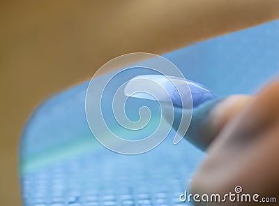 Freezing of acrylic nail by ultraviolet lamp Stock Photo