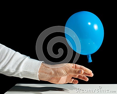 Freezing of a balloon that deflates Stock Photo