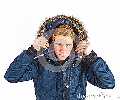 Freezing boy in winter clothes Stock Photo