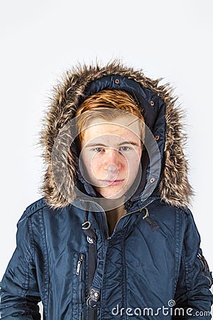 Freezing boy in winter clothes Stock Photo