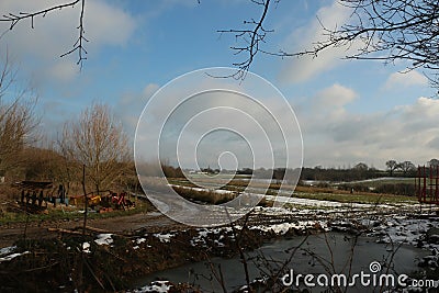 Freezing and muddy winter landscapes in England Stock Photo