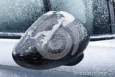 Freezing rain. Close-up details of a frozen parked car in the morning of a winter day. Stock Photo