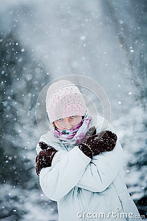 Freezing Woman during a Cold Winter Day Stock Photo
