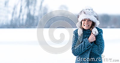 young freezing woman on winter icy lake. Banner. Copy space Stock Photo