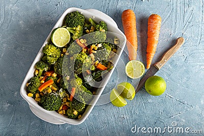 Frehs salad of boiled carrots and broccoli with spicy Stock Photo