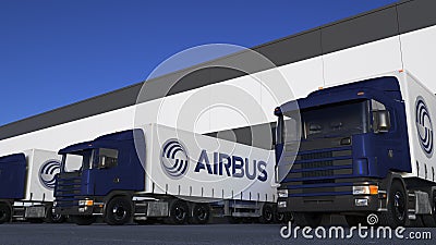 Freight semi trucks with Airbus logo loading or unloading at warehouse dock. Editorial 3D rendering Editorial Stock Photo