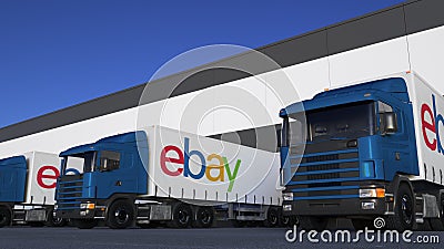 Freight semi trucks with eBay Inc. logo loading or unloading at warehouse dock. Editorial 3D rendering Editorial Stock Photo