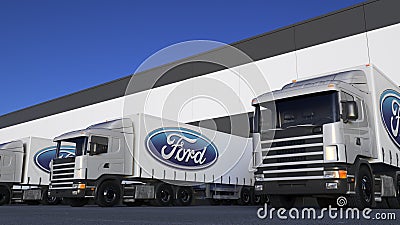 Freight semi trucks with Ford Motor Company logo loading or unloading at warehouse dock. Editorial 3D rendering Editorial Stock Photo