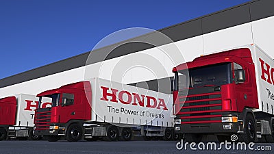 Freight semi trucks with Honda logo loading or unloading at warehouse dock. Editorial 3D rendering Editorial Stock Photo