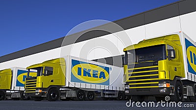 Freight semi trucks with Ikea logo loading or unloading at warehouse dock. Editorial 3D rendering Editorial Stock Photo