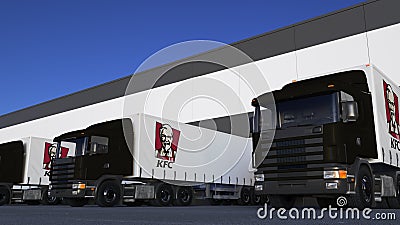 Freight semi trucks with Kentucky Fried Chicken KFC logo loading or unloading at warehouse dock. Editorial 3D rendering Editorial Stock Photo