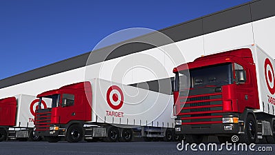 Freight semi trucks with Target Corporation logo loading or unloading at warehouse dock. Editorial 3D rendering Editorial Stock Photo