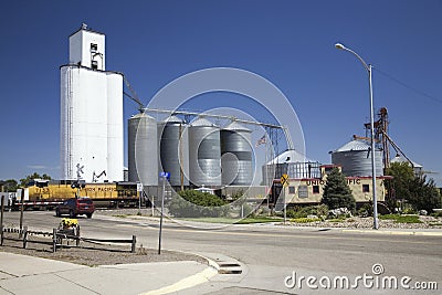 A freight train crossing near grain Editorial Stock Photo