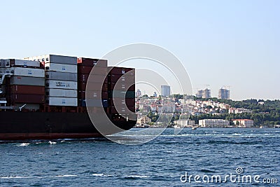 Freighter over Bosphorus Editorial Stock Photo
