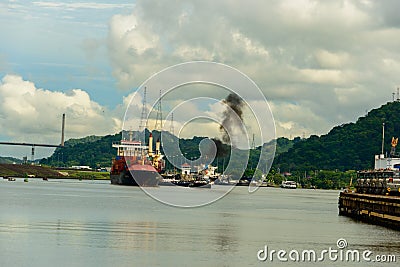 Freighter at the Pedro Miguel locks on the Panama canal Editorial Stock Photo