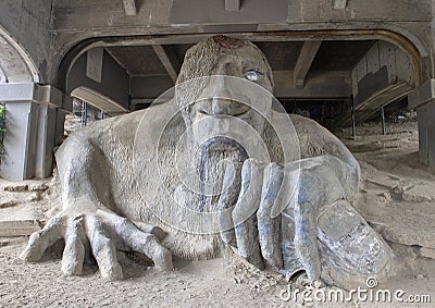 The Fremont Troll, a colossal statue under the north end of the George Washington Memorial Bridge in Seattle, Washington. Editorial Stock Photo