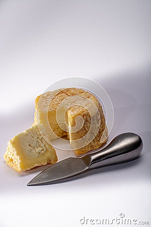 French AOC Langres soft cow crumbly cheese with washed rind stru Stock Photo