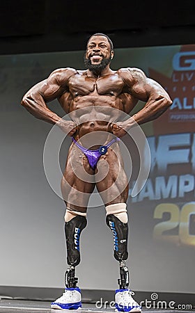 French Bodybuilder Competes as Bodybuilder with Prosthetic Legs Editorial Stock Photo