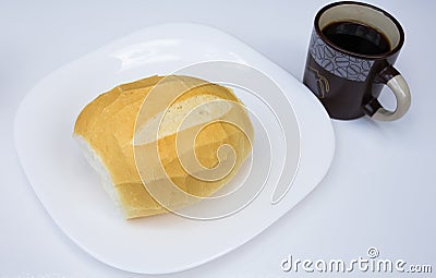 `French bread`, traditional breakfast Brazilian, served with coffee on white dish Stock Photo