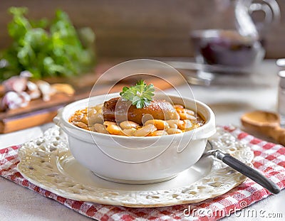 French Cassoulet. Hearty French sausage and bean stew with a crispy breadcrumb topping Stock Photo