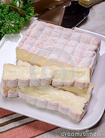 French cheeses collection, yellow Vieux Pane cheese with white mold Stock Photo