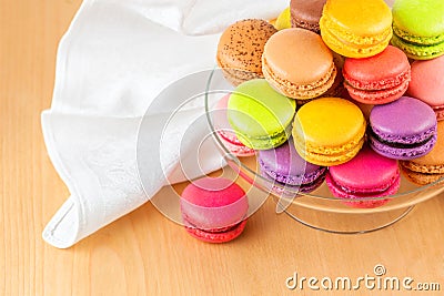 French colorful macarons in a glass cake stand Stock Photo