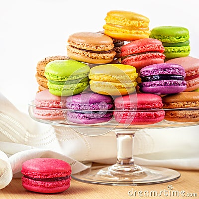 French colorful macarons in a glass cake stand Stock Photo