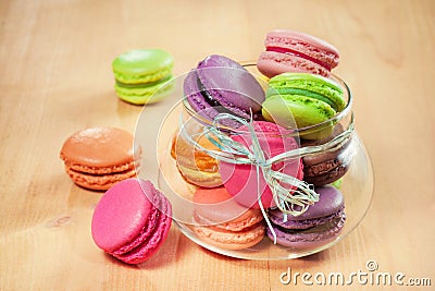 French colorful macarons in a glass Stock Photo